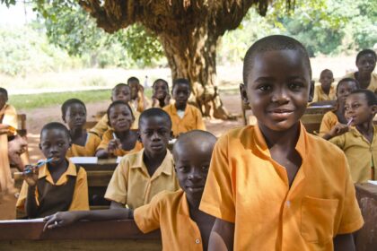Students in a classroom learning without smartphones on their desks